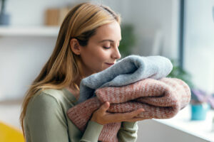 Specialist carefully cleaning a delicate garment